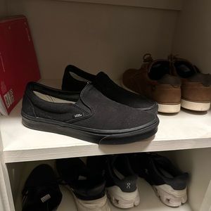 Vans all black slip on .  Male size 11 Female 12.5